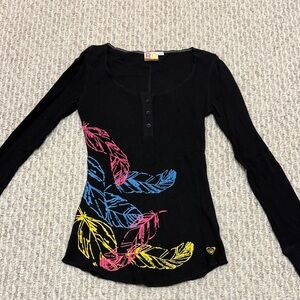 Roxy Black Long Sleeve Top with Vibrant Feather Design